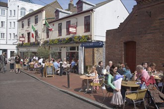 ENGLAND, East Sussex, Brighton, "People sat outside Donatello’s Italian restaurant in Brighton