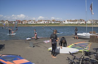 ENGLAND, East Sussex, Brighton, Hove lagoon with windsurfers