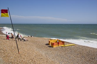 ENGLAND, East Sussex, Brighton, Life guard station on the beach at Hove.