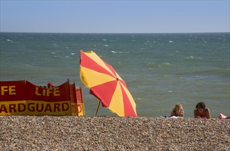 ENGLAND, East Sussex, Brighton, Life guard station on the beach.