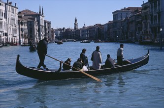 ITALY, Venezia, Venice, Grand Canal. Traghetti ferrying passengers across the canal.