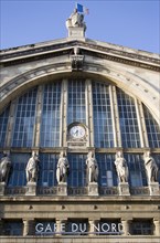 FRANCE, Ile de France, Paris, The front of the Gare du Nord railway station with statues and clock