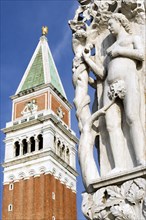 ITALY, Veneto, Venice, Stone carving of Eve and The Serpent on the corner of the Doges Palace in