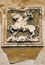 ITALY, Veneto, Venice, Wall carving of St George slaying the dragon