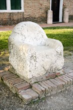 ITALY, Veneto, Venice, A marble seat said to be used as a throne by the 5th Century king Attila on