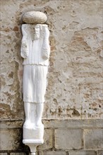 ITALY, Veneto, Venice, "One of the stone Moors in the Campo dei Mori supposedly depicting one of