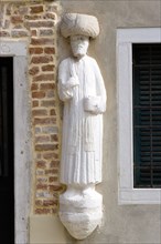 ITALY, Veneto, Venice, "One of the stone Moors in the Campo dei Mori supposedly depicting one of