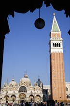 ITALY, Veneto, Venice, The Campanile and Basilica of St Mark in Piazza San Marco filled with