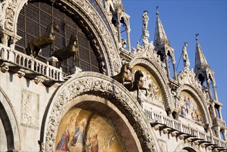 ITALY, Veneto, Venice, The bronze Horses of St Mark and the 17th Century mosaics on the facade of
