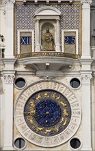 ITALY, Veneto, Venice, The Madonna on the Torre dell'Orologio clock tower above the ornate clock