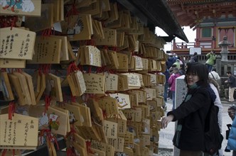 JAPAN, Honshu, Kyoto, Kiyomizu-dera Temple - prayers written on wooden tablets bring good luck to