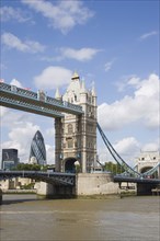 ENGLAND, London, Detail of  Tower Bridge on the River Thames with the Gherkin tower seen through