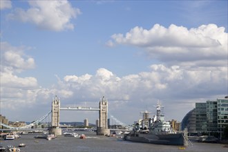 ENGLAND, London, View along the river Thames from London Bridge toward HMS Belfast and Tower Bridge