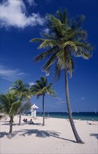 USA, Florida, Fort lauderdale Beach, View across sandy beach with lifeguard station seen through