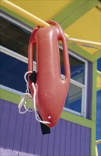 USA, Florida, Miami Beach, Rescue float hanging from colourful lifeguard station