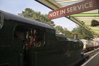 ENGLAND, Dorset, Swanage, Steam Railway Station. Train waiting in station with a Not in Service