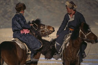 MONGOLIA, Bayan Olgi Province, Nomads, Kazakh nomads playing Bozkashi at Kazakh New Year festival.