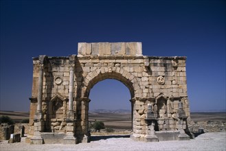 MOROCCO, Meknes, Volubilis, The Triumphal Arch of Volubilis. Roman Ruins