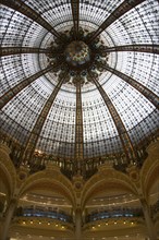 FRANCE, Ile de France, Paris, The Art Nouveau central glass dome of the Galeries Lafayette