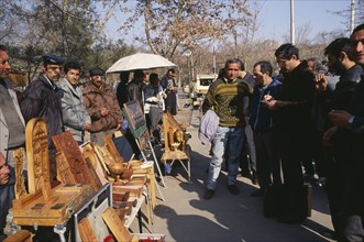 ARMENIA, Yerevan, Wood carvings including ‘cross stones’ on sale at Vernisarge weekend market.
