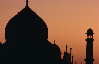 INDIA, Utter Pradesh, Agra, Taj Mahal minarets silhouetted at dusk