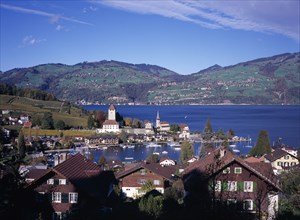 SWITZERLAND, Bernese Oberland, Spiez , View over roof tops towards Spiez Village and south bank of