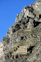 PERU, Near Cusco, Ollantaytambo, "Granary or grain silo on Pinkuylluna Mountain, Sacred Valley of