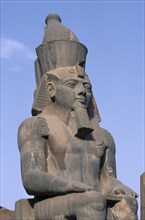 EGYPT, Nile Valley, Luxor, Luxor Temple. Ramses II seated statue