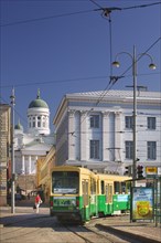 FINLAND, Helsinki, City centre tram with the Tuomiokirkko (Lutheran Cathedral) in the background.