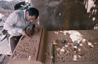 ARMENIA, Work, Craftsman carving a khatchkar or memorial stone.
