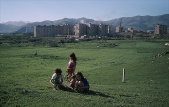 ARMENIA, People, Children, Children picking herbs on outskirts of Razdan.
