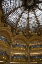 FRANCE, Ile de France, Paris, The Art Nouveau central glass dome and balconies of the Galeries