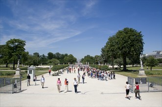 FRANCE, Ile de France, Paris, Tourists walking in the Jardin des Tuileries gardens