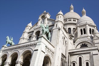 FRANCE, Ile de France, Paris, Montmartre The facade of the church of Sacre Couer with the bronze