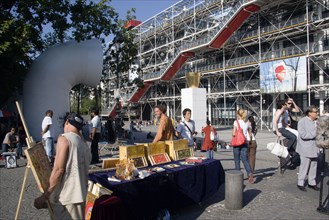 FRANCE, Ile de France, Paris, Artists selling their work amongst tourists in the Place Georges