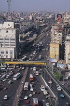 EGYPT, Cairo Area, Cairo, Elevated view over busy city road network with traffic running between