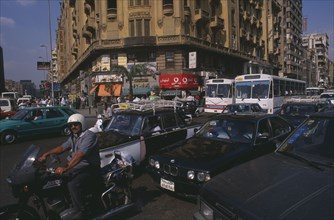 EGYPT, Cairo Area, Cairo, "Busy road with traffic including buses, taxis and motorbikes"