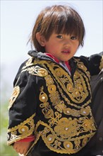 AFGHANISTAN, Bamiyan Province, Bamiyan , Portrait of young girl in traditional dress.