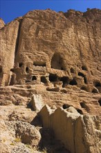 AFGHANISTAN, Bamiyan Province, Bamiyan , Caves in cliffs near empty niche where the famous carved
