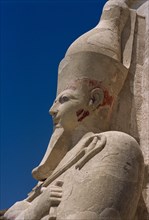 EGYPT, Nile Valley, Thebes, Deir-el-Bari. Hepshepsut Mortuary Temple. Side profile of Osiride