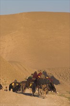 AFGHANISTAN, Desert, Kuchie camel train between Chakhcharan and Jam