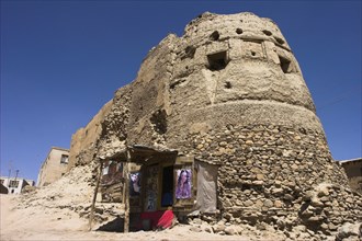 AFGHANISTAN, Ghazni, Shop next to the ancient walls of Citadel destroyed during First Anglo Afghan