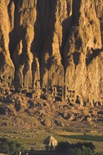 AFGHANISTAN, Bamiyan Province, Bamiyan, Tomb at base of cliffs near empty niche where the famous