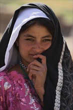 AFGHANISTAN, Ghor Province, Pal-Kotal-i-Guk, "Shy Aimaq nomad camp, Aimaq girl