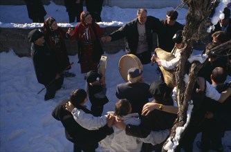 GREECE, North, Volakas, Traditional village wedding.  Dancing at the house of the bride before the