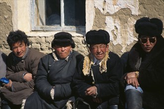 MONGOLIA, Bayan Olgii Province, Kaz, Kazakh nomad men at New Year celebrations.
