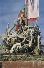 NEPAL, Mustang, Lo Manthang, Shrine of goat skulls and antlers protecting the palace of the king