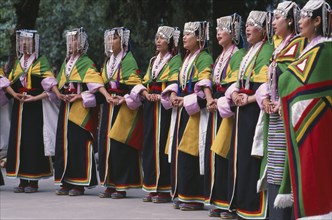 INDIA, Himachal Pradesh, Dharamsala, Tibetans wearing traditional costume to celebrate the birthday