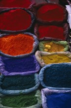 NEPAL, Patan, Brightly coloured dyes for sale in market.