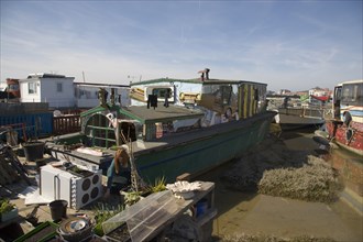 ENGLAND, West Sussex, Shoreham-by-Sea, "Houseboat moored along the banks of the river adur.  Former